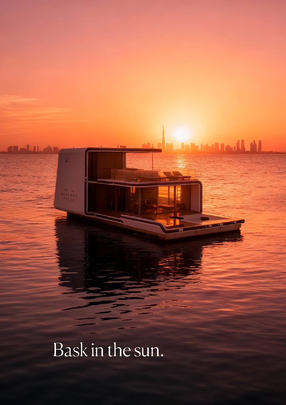 Floating Residences, a residence on open water at sunset, the Dubai skyline behind